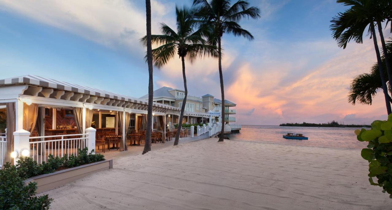 View of terrace and ocean at sunset at Pier House Resort and Spa Key West