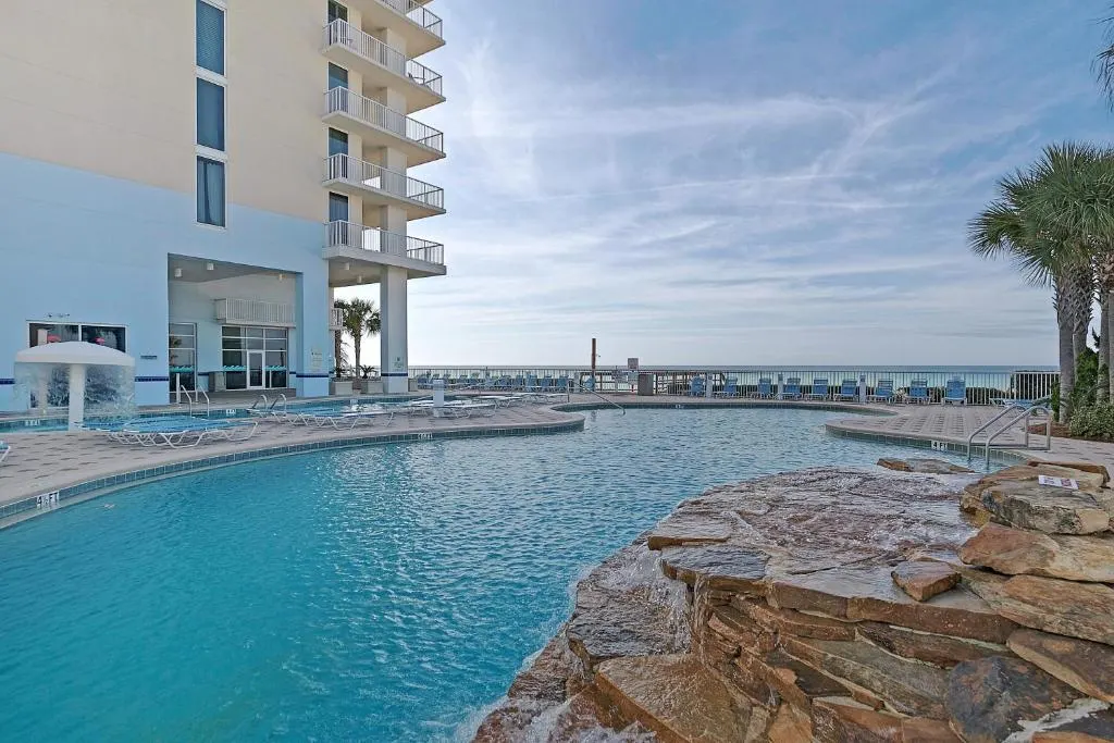 Outdoor pool overlooking the beach and ocean at Majestic Beach Resort in Panama City Beach